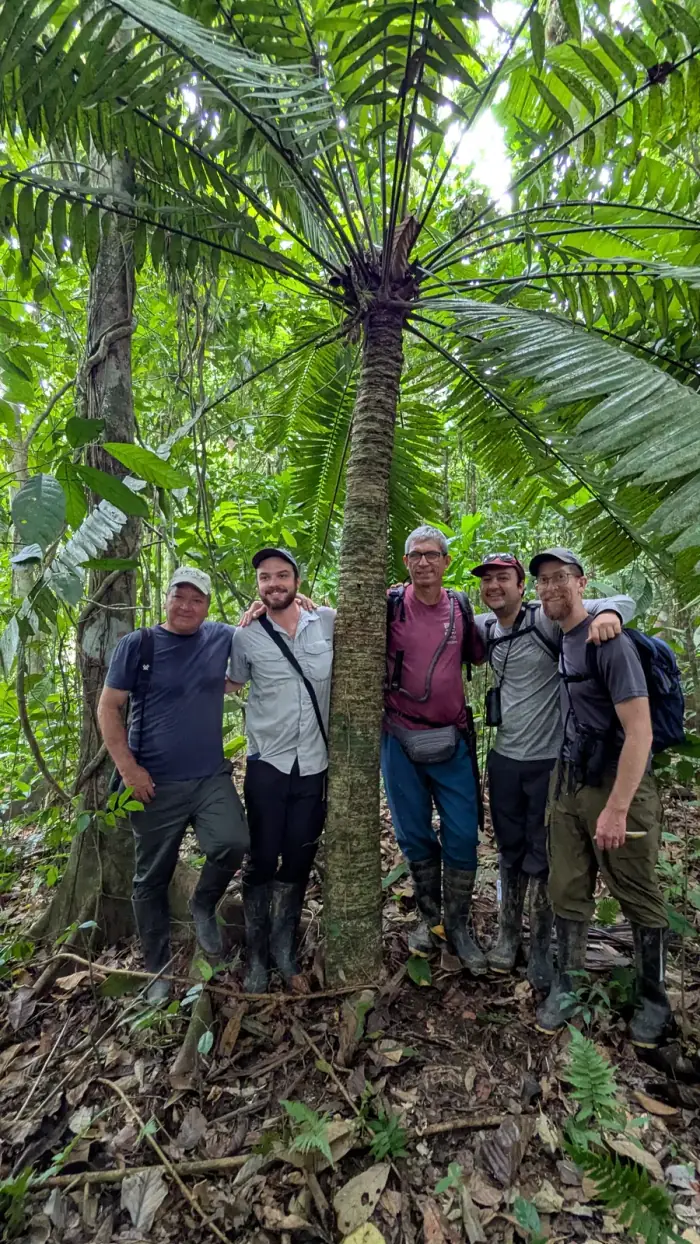 Field team posing with a Zamia cycad